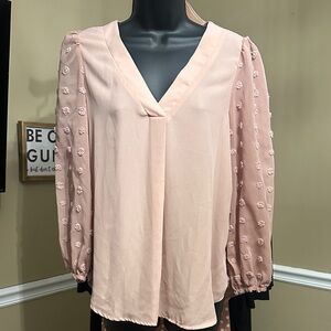 Elegant Pink Blouse with Textured Sleeves